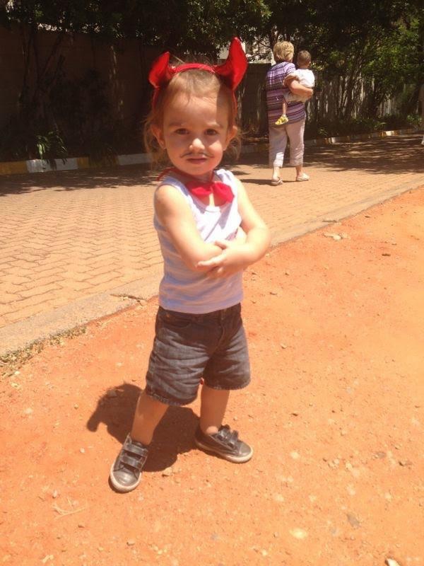 Taye in devil costume