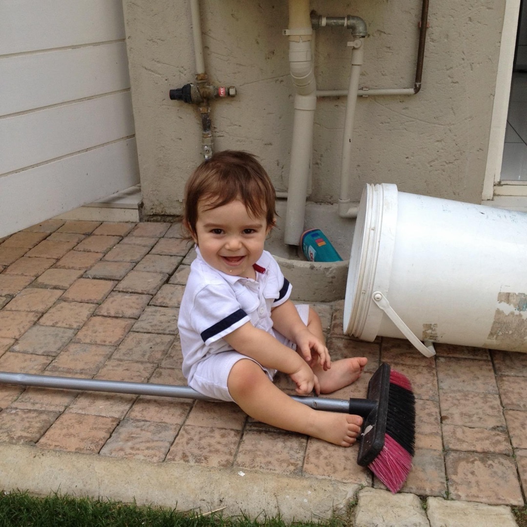 Toddler with broom